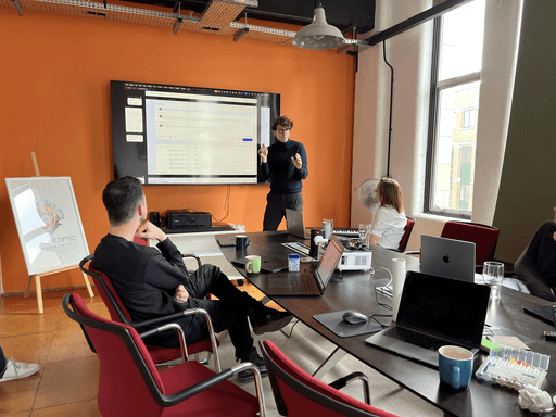 A SIROC working session reviewing a product on screen with a client team